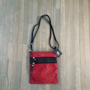 Lucia Pelletterie Leather Crossbody Bag